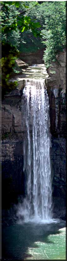 Panorama of the sun shinning on Taughannock Falls on Mid Summer's Day.