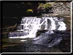 A series of waterfalls along the trail in Robert Treman State Park.