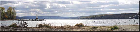 Panorama photograph of the lighthouse and Cayuga Lake at Myers Point.